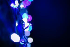 Abstract bokeh background. Blurred garland lights. photo
