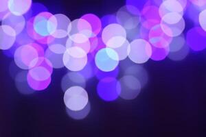 Abstract bokeh background. Blurred garland lights. photo