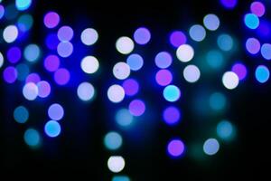 Abstract bokeh background. Blurred garland lights. photo