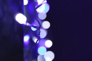 Abstract bokeh background. Blurred garland lights. photo