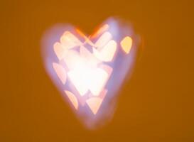Heart bokeh colorful unfocused background. Valentine day concept. photo