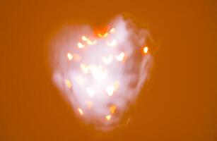 Heart bokeh colorful unfocused background. Valentine day concept. photo