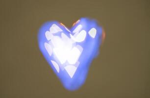 Heart bokeh colorful unfocused background. Valentine day concept. photo