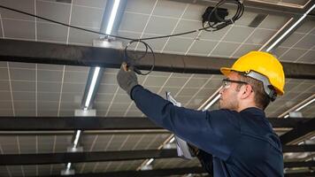 Engineer technical service checking installation solar cell panel and check all the lists on clipboard photo