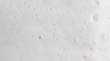 White Soapy Foam Texture with Bubbles photo