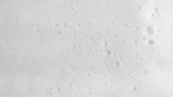 White Soapy Foam Texture with Bubbles photo