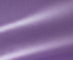 Violet color paper background, smooth glowing shining texture, light gradient photo