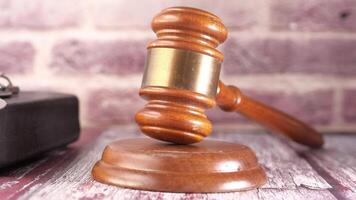 Judge gavel and keys on wooden table video