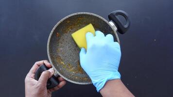 Here are various techniques for effectively cleaning a dirty pan while ensuring safety with gloves video