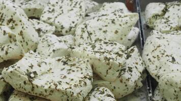 Delightful Herbed Creamy Soft Cheese Blocks Beautifully Arranged and On Display for All video