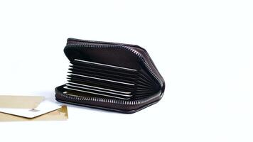 A black wallet with a card holder and a card video