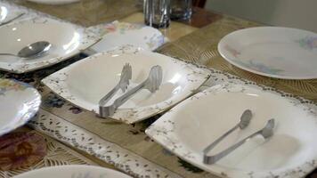 An Elegant and Stylish Dining Setup Complete with Plates and Silverware for Special Occasions video