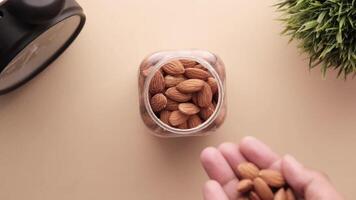 Almonds in a jar on a table video