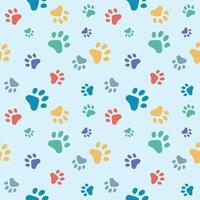 Seamless pattern with cat paw prints vector