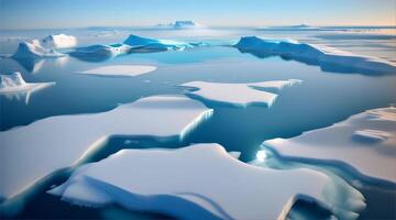 Icebergs floating in the ocean with a blue sky video