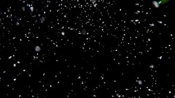 Snowfall on Black Background with Blurred Snowflakes - 3D Render photo