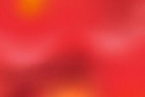 Red and Yellow Gradient Abstract Background with Blurry Color Splash photo