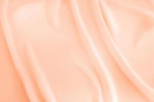 Elegant Peach Fuzz Silk Fabric with Soft Pleats - Ideal for Designer Text Mockups, Luxury Cards, and Retro Backgrounds photo