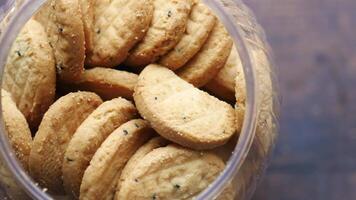 A close up of a container filled with cookies video