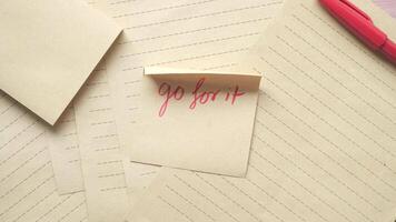 Go for it note on paper with pen video