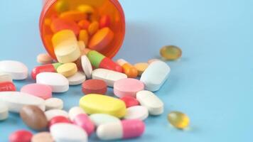 Pills spilling out of an open prescription bottle video