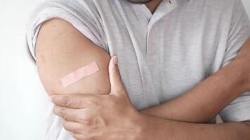A man with a bandage on his arm video