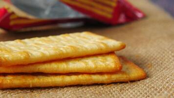 A close up of three crackers on a table video