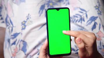 Green screen on a smartphone in hand video