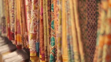 Colorful fabric on display in a store video