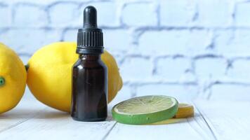 Lemon essential oil and a bottle of essential oil video