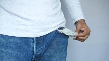 A man is holding a wallet in his pocket video