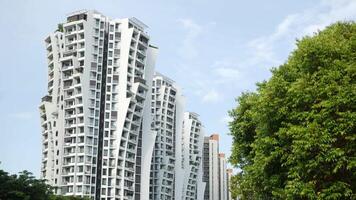 A tall building with many balconies on the side video