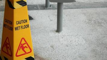 A caution net floor sign is shown next to a yellow caution cone video