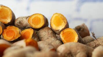 A pile of tumeric with the peel on top video