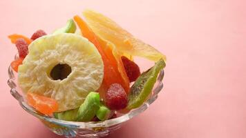 A glass bowl filled with various fruit and vegetables video