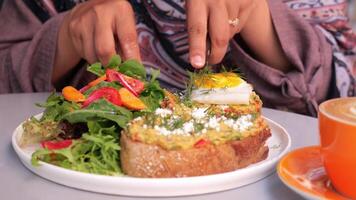 Savor delicious Avocado Toast with a Fried Egg, served with a Fresh Salad on the side video
