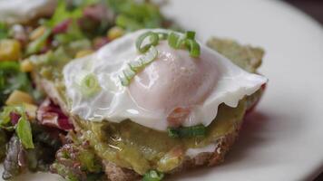 Savor delicious Avocado Toast with a Fried Egg, served with a Fresh Salad on the side video