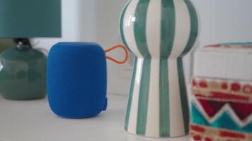 smart speaker clock and notebook on table video