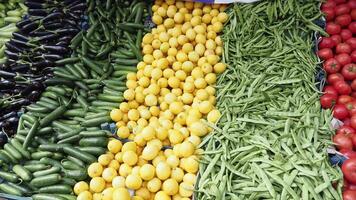 A Vibrant and Colorful Market Display Featuring an Abundance of Fresh Vegetables and Fruits video