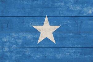 Somalia Flag on Rustic Wooden Background - Grunge Texture photo