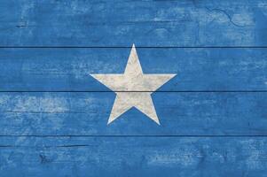 Somalia Flag on Rustic Wooden Background - Grunge Texture photo