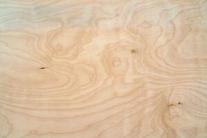 Light plywood texture. Patterned wooden background. Wood product. photo