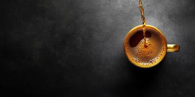 A top view of a golden coffee cup as coffee pours in, set against a sleek black background, perfect for a cozy coffee moment photo