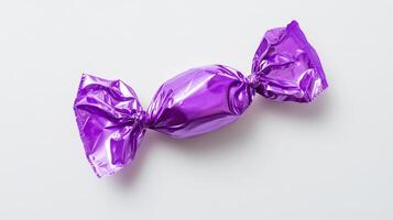 This shiny purple candy, wrapped in glossy foil, is a delightful treat for any sweet tooth. Ideal for sharing or savoring alone, it guarantees satisfaction with every scrumptious bite photo