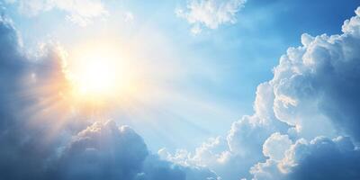 In a serene scene, the sun casts warm rays through soft clouds, creating a bright blue sky that evokes peace and natural beauty, captivating those who appreciate its charm and wonder photo