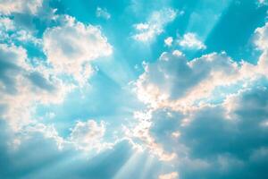 This picturesque scene has a bright blue sky, fluffy white clouds, and radiant sunlight, creating a tranquil atmosphere for all to enjoy and appreciate the surrounding natural beauty photo