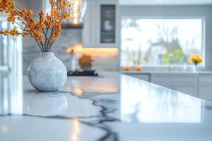 This is a beautifully bright and modern kitchen, showcasing a stunning marble countertop along with stylish decor that together create a truly inviting atmosphere for anyone who enters photo