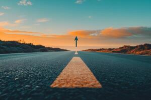 An open asphalt road stretches far and wide into the distance, clearly marked by an arrow, symbolizing a meaningful journey into future achievements and significant growth amidst a stunning sunset photo