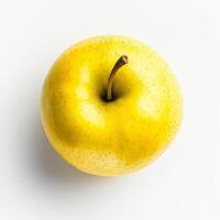 A yellow apple on a white background photo