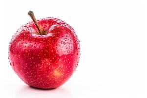 A red apple with water droplets on it photo